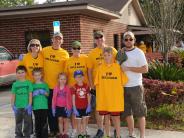 Family and Friends Gathered Around for the Town Clean Up