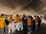 Family and Friends Gathered Around for the Town Clean Up