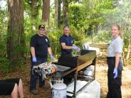 Family and Friends Gathered Around for the Town Clean Up