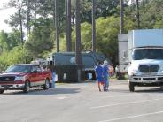 Family and Friends Gathered Around for the Town Clean Up