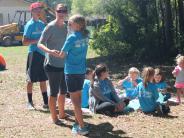 Family and Friends Gathered Around for the Town Clean Up