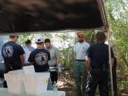 Family and Friends Gathered Around for the Town Clean Up