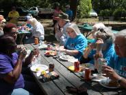 Family and Friends Gathered Around for the Town Clean Up