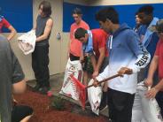 Friends and Family Gather Around for the Town Clean Up