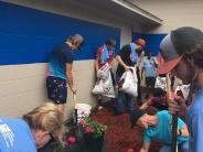 Friends and Family Gather Around for the Town Clean Up