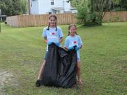 Friends and Family Gather Around for the Town Clean Up