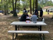 Friends and Family Gather Around for the Town Clean Up