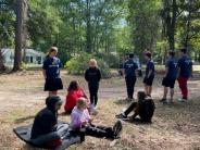 Friends and Family Gather Around for the Town Clean Up