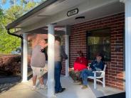 Friends and Family Gather Around for the Town Clean Up