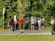 Friends and Family Gather Around for the Town Clean Up