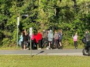 Friends and Family Gather Around for the Town Clean Up