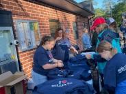 Friends and Family Gather Around for the Town Clean Up