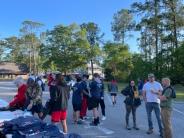 Friends and Family Gather Around for the Town Clean Up