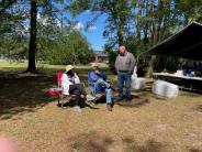 Friends and Family Gather Around for the Town Clean Up