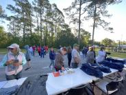 Friends and Family Gather Around for the Town Clean Up