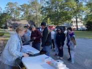 Friends and Family Gather Around for the Town Clean Up