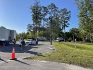 Friends and Family Gather Around for the Town Clean Up