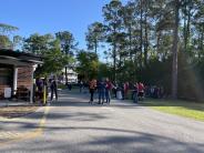 Friends and Family Gather Around for the Town Clean Up