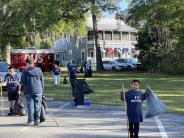 Friends and Family Gather Around for the Town Clean Up