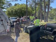 Friends and Family Gather Around for the Town Clean Up